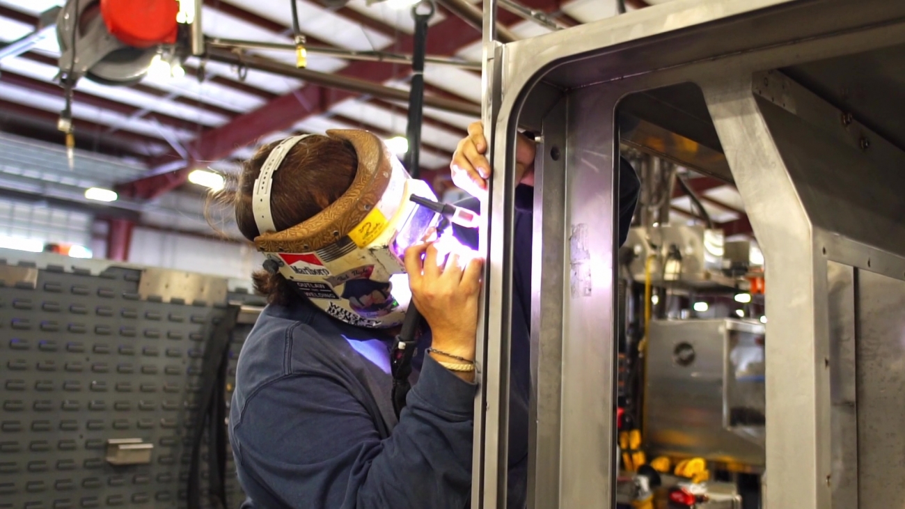 person welding